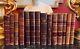 A Collection Of French Antique & Vintage Burgundy Leather Bound Hardcover Books
