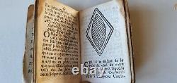Extremely rare illustrated miniature prayerbook 1676, in original leather bag