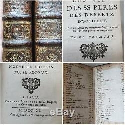 Two rare books from 1711 in fine gilded bindings with 119 engravings of Saints