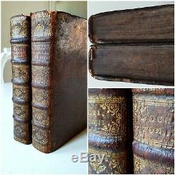 Two rare books from 1711 in fine gilded bindings with 119 engravings of Saints