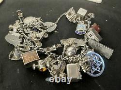 Vintage Sterling Silver & 35Charms, bank of london check book rare Charm Bracelet