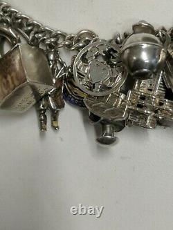 Vintage Sterling Silver & 35Charms, bank of london check book rare Charm Bracelet